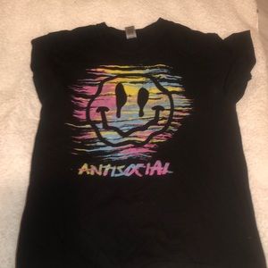 Multi-colored smiley faced graphic tee.